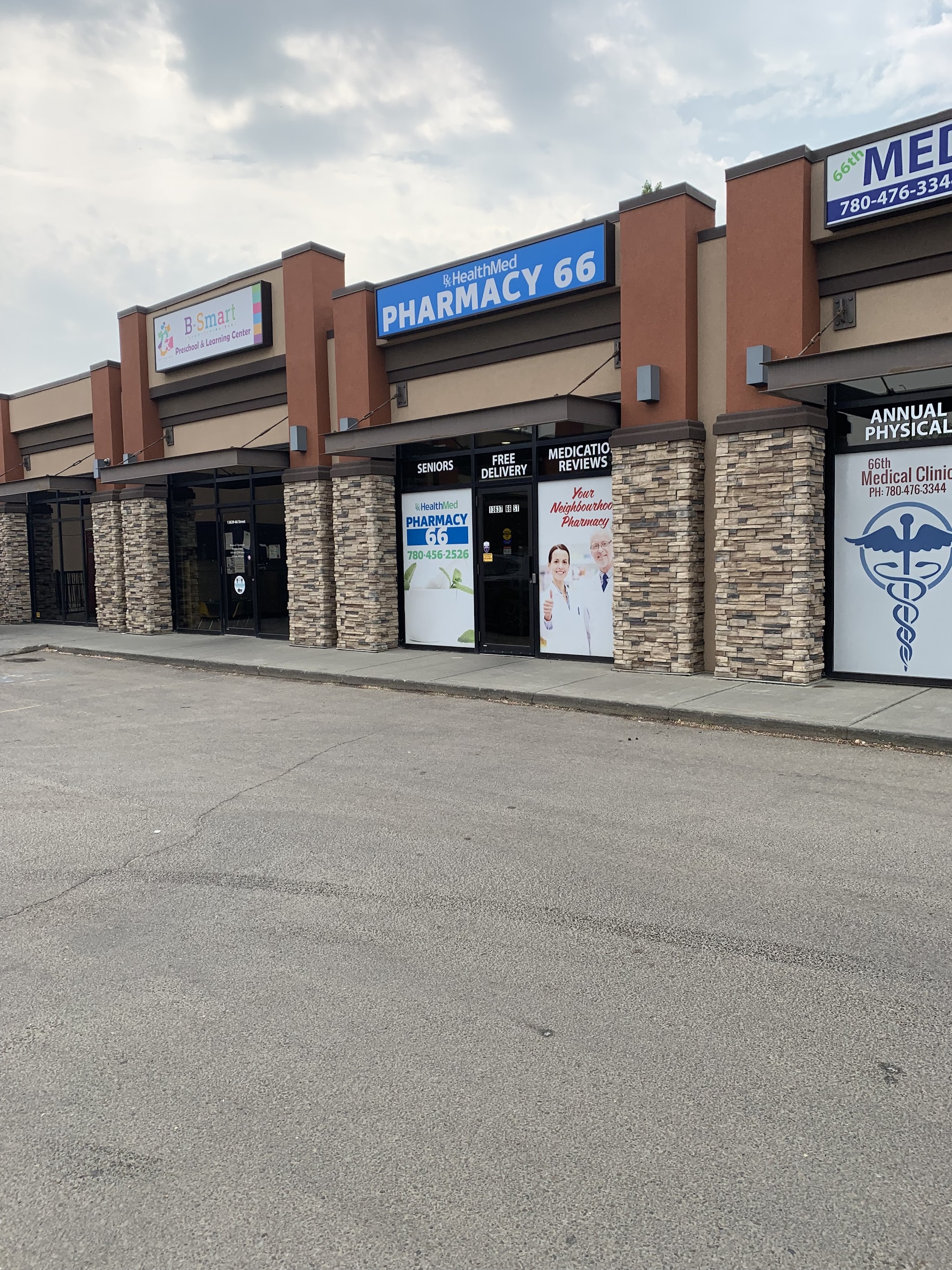 Pharmacy 66 storefront showing the blue and teal sign with services listed in the window